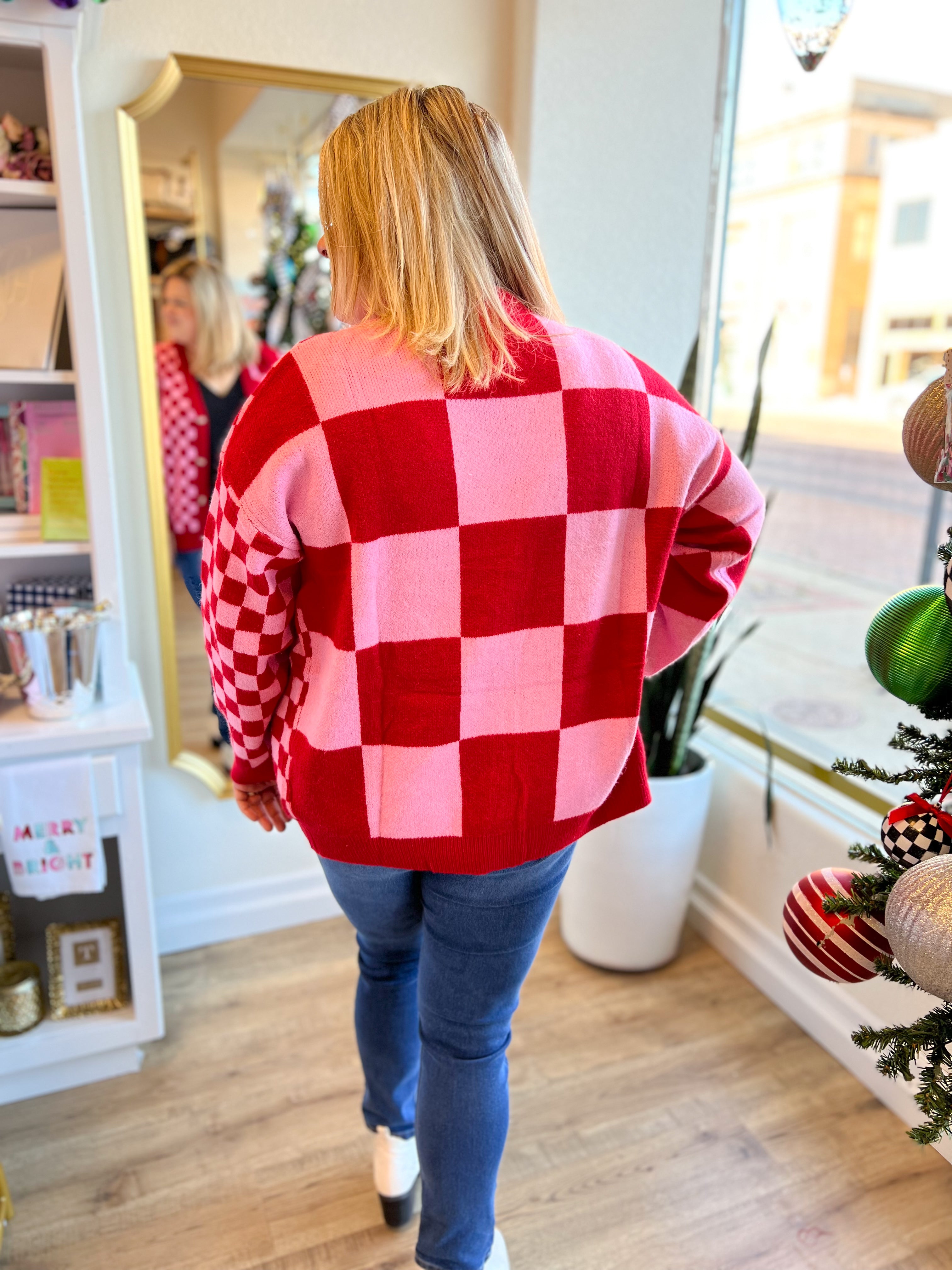 Checkmate Cupid Pink Red Checkered Sweater